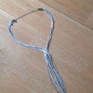 Elegant silver tone chain necklace.